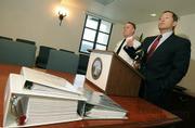 Santa Barbara Senior Deputy District Attorney Jerry Lulejian (right) and County Fire Chief Michael Dyer discuss the Jesusita Fire case
