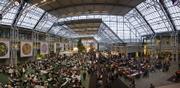 This is the view of the conference's cafeteria area from above. Guess how many laptops?
