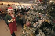 Lisa Bidlow, three years off the streets, now happily volunteers at the Rescue Mission where she herself sought services when she was homeless.