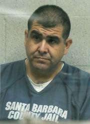 Sergio Quintana, in custody, at his Dec. 31, 2009 arraignment for his alleged role in a stabbing that took place on Milpas Street Christmas morning 2009.