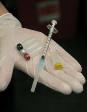 Above is the 0.4 mL injection-made up of four different strains of dead lung cancer cells-that participants will receive on a monthly basis.