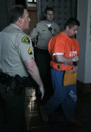 Steven Cisneros leaves the courtroom 01/11/10 to begin his sentence of 56-years-to-life in prison for the murder of Lawrence Kaiser