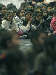 Harding students listen intently as speakers at Friday's event praised the positive elements of the newly minted partnership