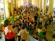 It's 15 minutes after 11, the beginning of a popular class time slot, and more students crowd this common area to socialize than go to classes.