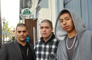 Osiris Castenedas, far left, poses with students of the Youth CineMedia Project outside of Victoria Hall.