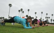 L to R Denisse Elizarraraz, Andrea Rosales, Liz Gomez, and Veronica Duran of Santa Ynez Valley High School work out at La Playa Stadium
