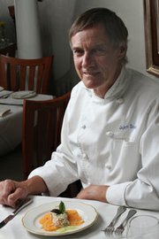 John Downey with a Fresh Local Crab Salad appetizer with Tuscan melon, pine nuts and fresh ginger-lime dressing.