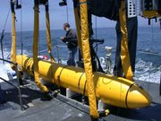 MBARI's mapping AUV is prepared for launch from the research vessel Zephyr by Senior Research Specialist Dave Caress.