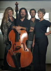 Jim Connolly (second from left) brought his Gove County String Quartet and a night full of tunes to last weekend's Lit Moon World Theatre Festival.