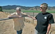 <strong>RURAL AND WORRIED:</strong> Living next to farmland seems dreamy until the pesticides come raining down, says Cuyama Valley residents Jolaine Gorilla (left) and Nancy Ingalls. “They are making precautions for pickers to wear protective suits and get blood tests, but yet we have to live here,” said Ingalls, whose oncologist told her to leave the area during a recent spray of malathion. State law, however, allows the use of pesticides, so long as the label directions are followed properly. Said one farm manager, “When they live out in an agricultural area, they have to expect farming to go on at some level.”