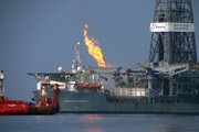 Scientists aboard the R/V Cape Hatteras deploy sensors and sampling devices into the water a short distance from the Deepwater Horizon containment and relief well operations.