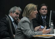 City planners Bettie Weiss (center) and John Ledbetter (left), with Assistant City Administrator Paul Casey (right)