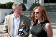 Mari Mender at the press conference held two weeks ago after two of her signs were burned.