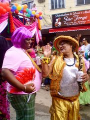 Some drag queens enjoy the early festivities of the Parada Gay da Rocinha Sunday, November 25.