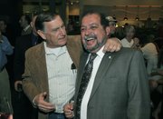 Mario Borgatello (left) congratulates Roger Aceves re-election to Goleta City Council at Hollister Brewing Co