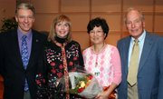 Simon and Karen Fox, with Sung Park, nurse practitioner, employee award winner for exemplary compassionate care, and Richard Schilling MD, sponsor of the lecture and award.