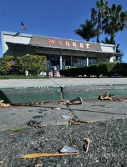 Broken glass outside of City Market in Carpinteria allegedly caused by the fleeing stabber.