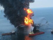 Vessels combat the fire on the Deepwater Horizon while the United States Coast Guard searches for missing crew