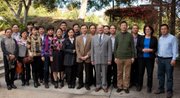 The Hangzhou delegation is with District Director Terry Dressler (seventh from right) and Public Information Officer Mary Byrd (second from right).