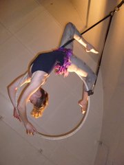Helen Dickson performed on the lyra, a metal hoop hanging from the ceiling, during La Petite Chouette's recent showcase.