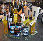 <strong>NOT JUST OLIVES:</strong> Olive oil isn’t the only thing for sale at Los Olivos’ Global Gardens, where gourmets can find everything from snack mix to cookbooks.