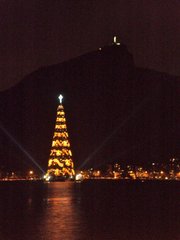 An 85m tall cone of lights offers a Christmas light show in the middle of Rio's picturesque lagoon.