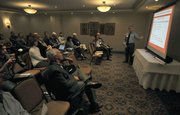 Marck Aguilar presents during Wednesday's meeting on the "State Street Bench Relocation Pilot Project"