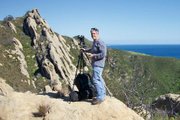 Off the beaten path looking for just the right photograph of the amazing Gaviota sandstone, Greg enjoys a moment of relaxation.