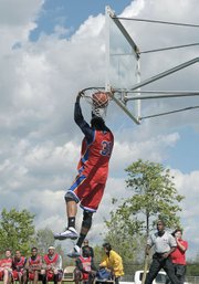 Santa Barbara Breaker Jerry Dupree scored a reverse dunk against the Ventura Jets last Saturday during a blustery b-ball game.