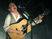 Mumford & Sons frontman Marcus Mumford sings his heart out to a rapt audience at the Bowl last Monday.