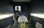 J7 surf shop owner Jason Feist in the shaping room at his new location on Mason Street in the heart of Santa Barbara's Funk Zone.