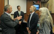 Tony Vegel, Geoff Miller, Marc Chytilo, and Lauren McElroy talk after the NRC meeting at the Santa Barbara County Supervisors June 16, 2011