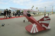 A large model plane by the red carpet welcoming to the Santa Barbara Airport remodel grand opening June 17, 2011