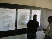 Heads of local schools brainstorming about a plan of action for funding pressing school projects.