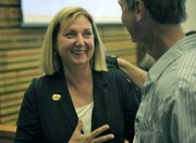 <em>Independent</em> Editor-in-Chief Marianne Partridge (left) with <em>Independent</em> Executive Editor Nick Welsh at the conclusion of the original trial in August 2011
