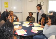 Associate Professor Margaret Prothero, an Express to Success Program faculty member, gave feedback to an assignment that students completed in the ESP Basic Skills workshop orientation.