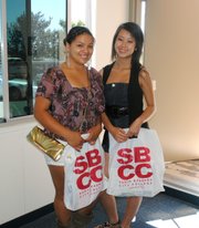 Two SBCC students picked up the loaned books they received for their upcoming fall studies in the Express to Success Program.
