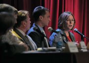 DOGGR's Marni Weber (right) sits next to Brian Segee with the Environmental Defense Center