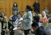 Concerned parent Martha Cruz speaks at a Pueblo sponsored forum discussing a gang injunction on Oct. 20, 2011