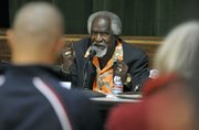 Babatunde Folayemi speaks at a Pueblo sponsored forum discussing a gang injunction on Oct. 20, 2011