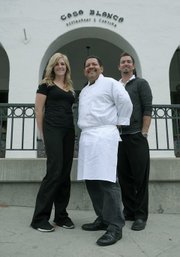 Casa Blanca's owner Adam White (right) and manager Samantha Winstrom (left) believe new chef Onofre Zuniga will please the masses.