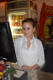 This is 8th grader Hannah Montgomery-Kriegler behind the counter at Via Maestra Resturant in 2010.