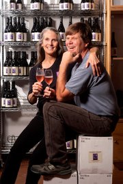 Kate Griffith and Norm Yost toasting the sparkling Pinot Noir called Goat Bubbles Rosé, from Solomon Hills Vineyard in Santa Maria Valley AVA.
