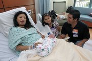 Augustin Arroyo, born 8 lbs. 6 oz. at 7:48 a. m.. Feb. 12, with mom Maria, dad Augustin and sister Diana was the first baby born in the new Cottage Hospital facility,