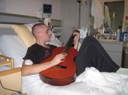 Zack Hansen, son of SOhO Restaurant & Music Club owners Bob and Gail Hansen, spent a large chunk of his hospital stays playing guitar. This Thursday, Zack will play SOhO as part of an all-star benefit concert to help with the cost of his medical bills.