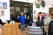 Ernst Storm explains winemaking to Elderhostel's Road Scholars at Curtis Winery last Thursday.