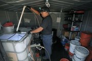 Tribal descendant Andrew Mendoza works for the tribe’s Environmental Office and tends to the reservation’s budding biofuel station, preparing veg-oil waste from the casino to be used as fuel for work trucks.