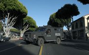 The SBPD's Bearcat armored vehicle responds to reports of a woman with a handgun barricaded inside her Milpas Street apartment