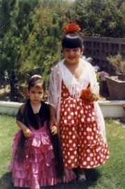 The author’s family has been involved in Fiesta for generations. Her daughters Laura and Debbie were decked out in 1971.