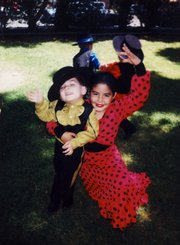 The author's grandchildren Nico Haas and Marissa Urzua get ready for the festivities.